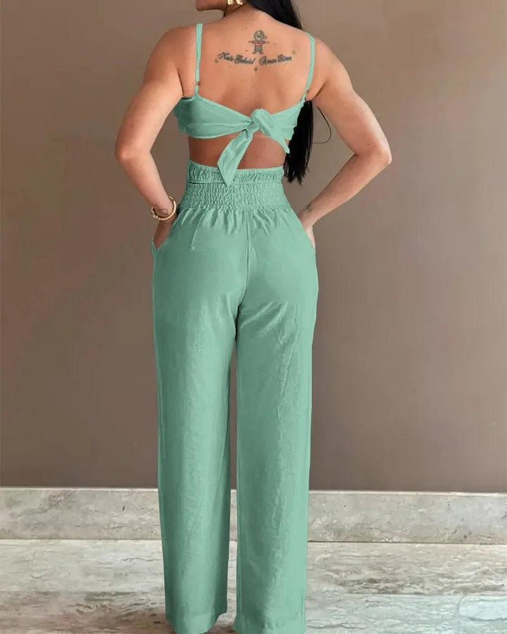 2024 Summer Fashion Jumpsuit Women Floral Pattern Shirred Hollow Out Casual Asymmetrical Neck Pocket Backless Jumpsuit-THAT FASHION STORE