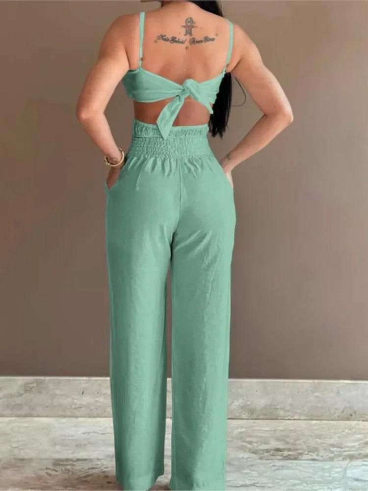 Summer Spaghetti Strap Fashion Jumpsuit New Women Floral Pattern Shirred Hollow Out Casual Asymmetricsal Neck Backless Jumpsuits-THAT FASHION STORE